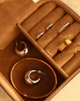 Day In May pieces in a brown jewellery box